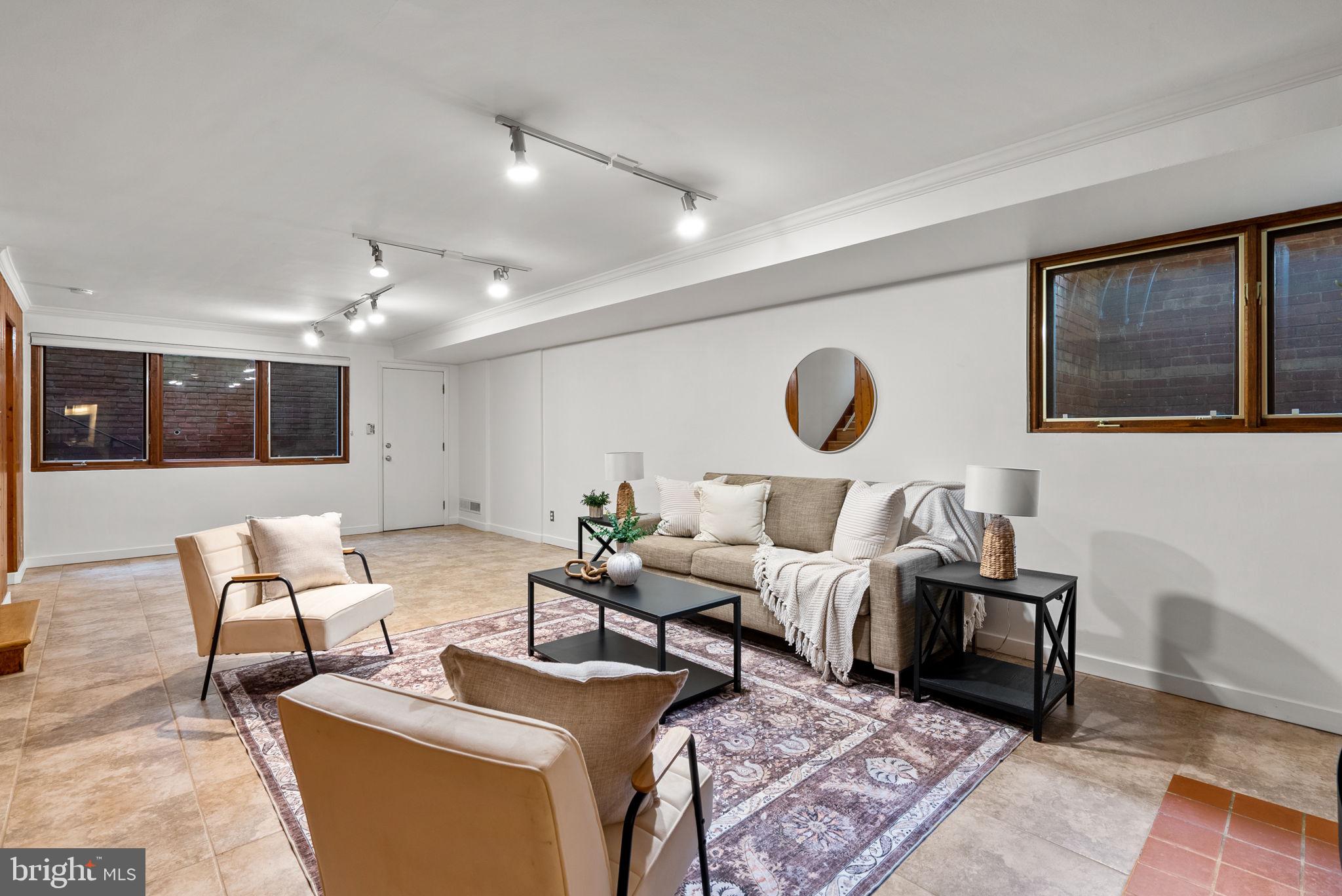 9109 Fairview Road Silver Spring, MD 20910 - Photo 35 of 46 a living room with furniture and wooden floor