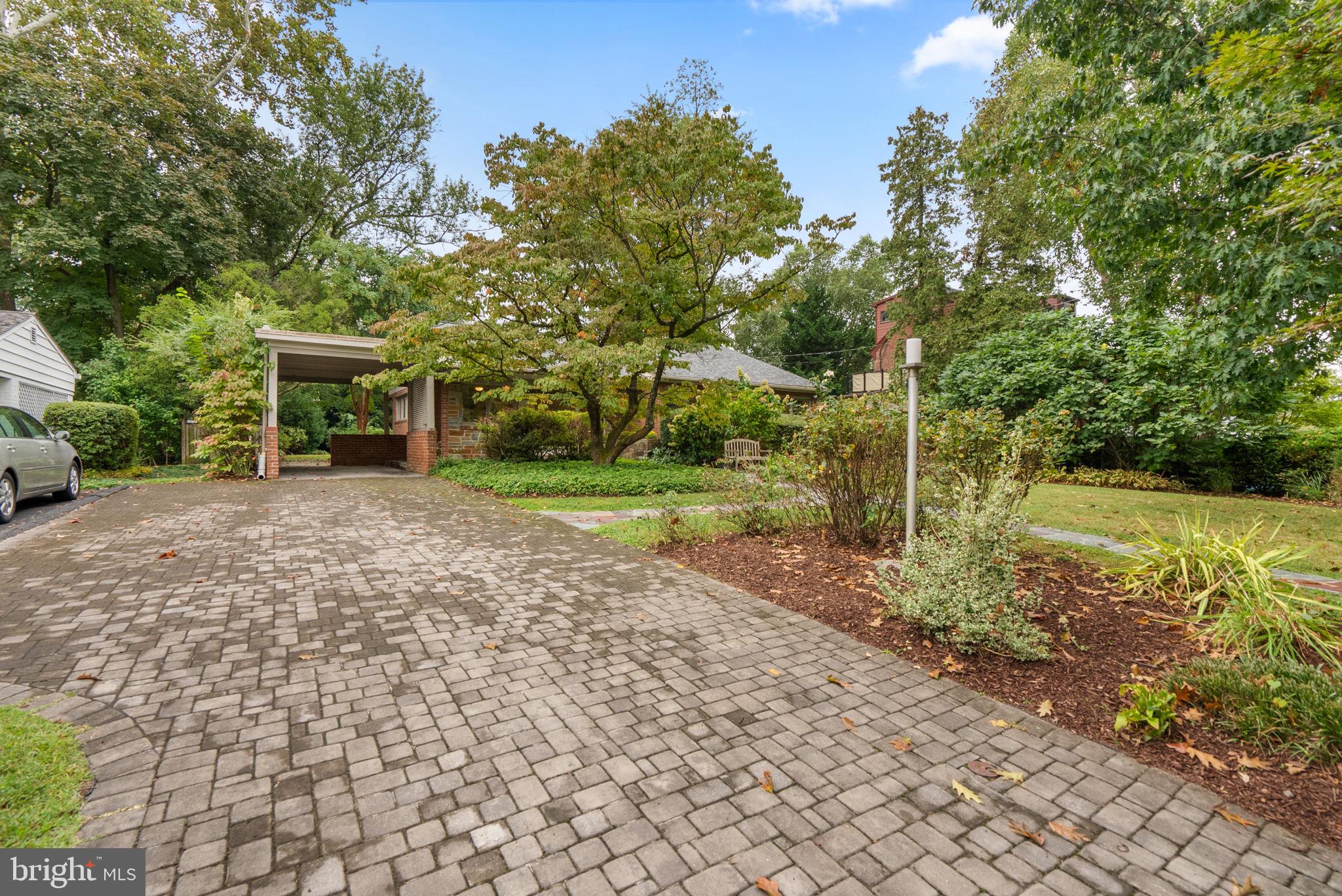 9109 Fairview Road Silver Spring, MD 20910 - Photo 42 of 46 a view of a house with backyard and trees