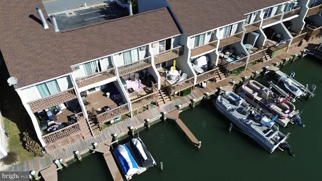 a view of a chairs and table in patio