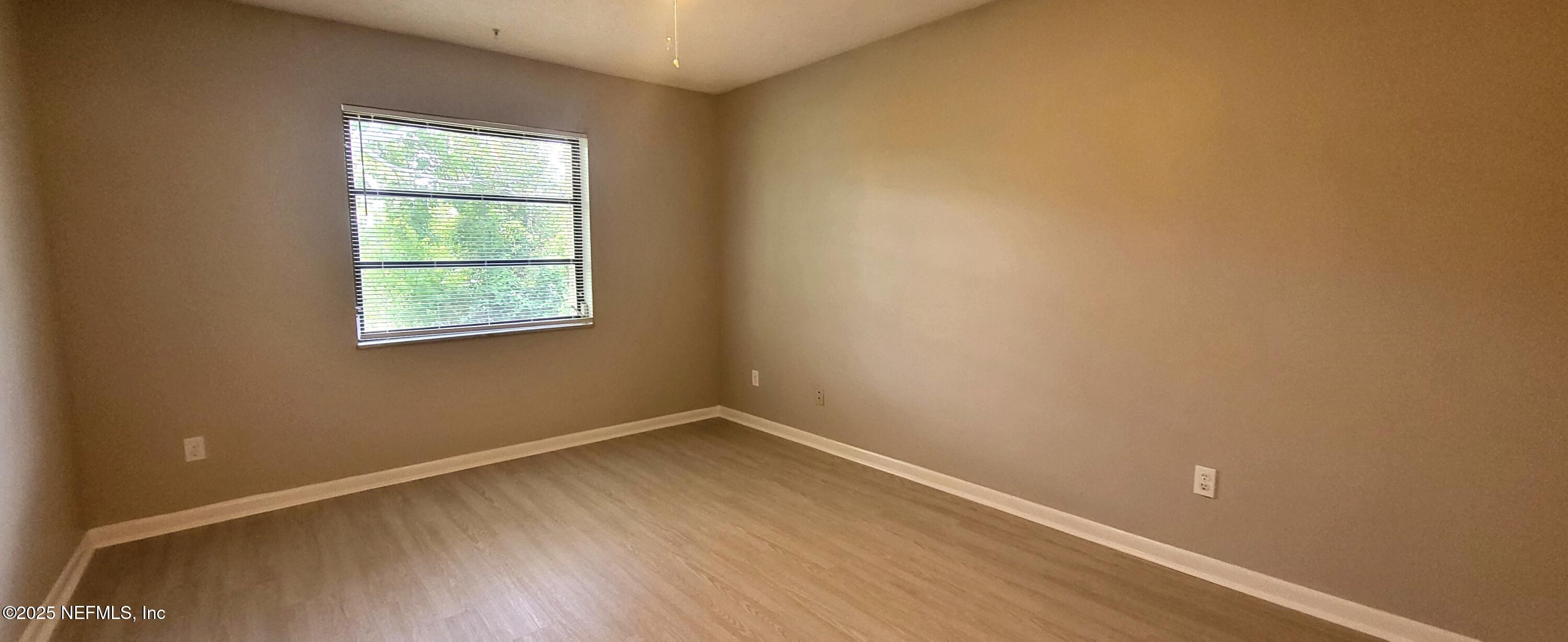 600 Domenico Circle, Unit A12 St. Augustine, FL 32086 - Photo 7 of 11 an empty room with a window