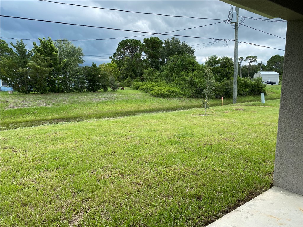 109 Aetna Street, Unit B Sebastian, FL 32958 - Photo 24 of 26 a view of a garden