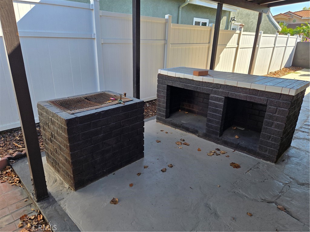 11816 Arlee Avenue Norwalk, CA 90650 - Photo 22 of 30 a stove top oven sitting inside of a kitchen