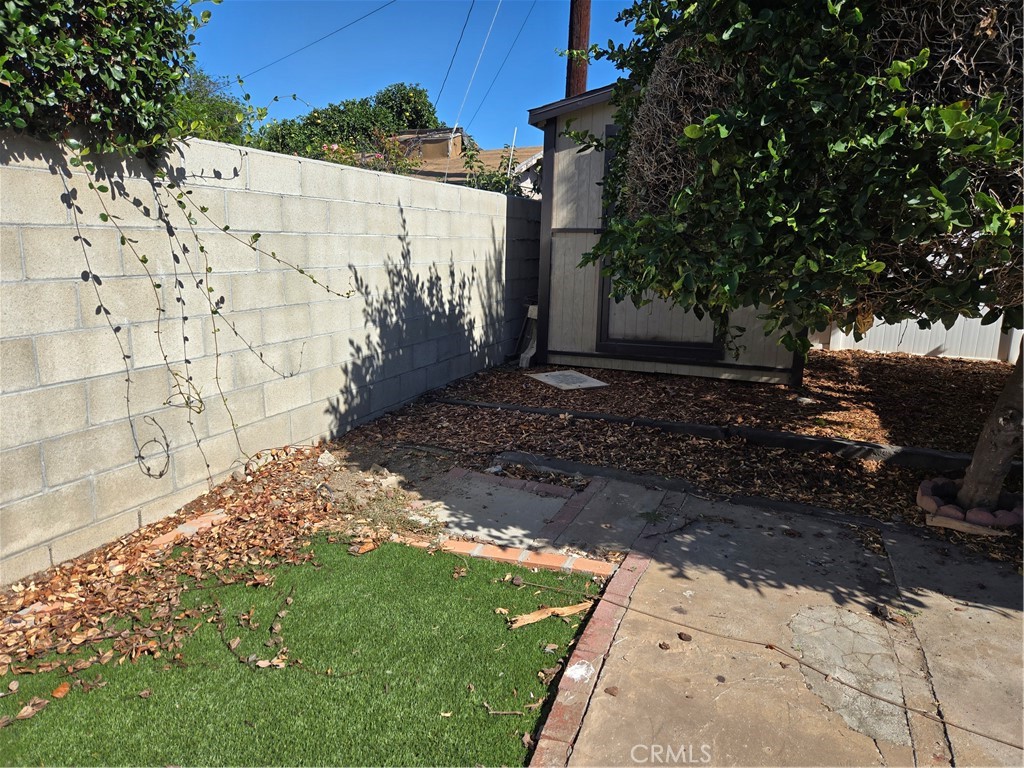11816 Arlee Avenue Norwalk, CA 90650 - Photo 25 of 30 a view of a yard with plants and trees