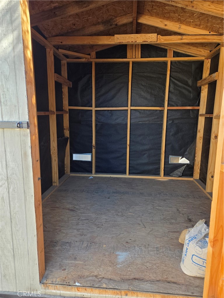 11816 Arlee Avenue Norwalk, CA 90650 - Photo 27 of 30 a view of an empty room with wooden floor