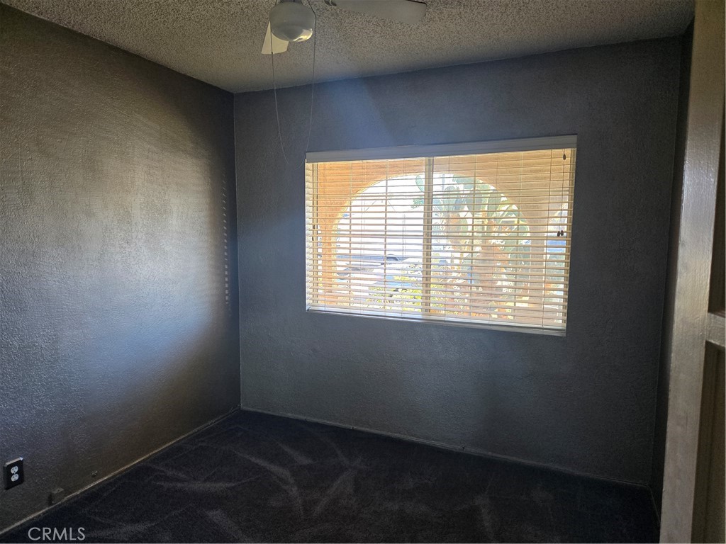 11816 Arlee Avenue Norwalk, CA 90650 - Photo 10 of 30 a view of an empty room with a window