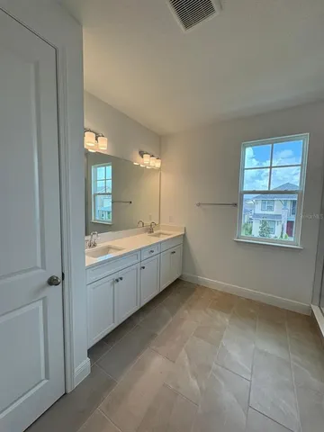 a bathroom with a window