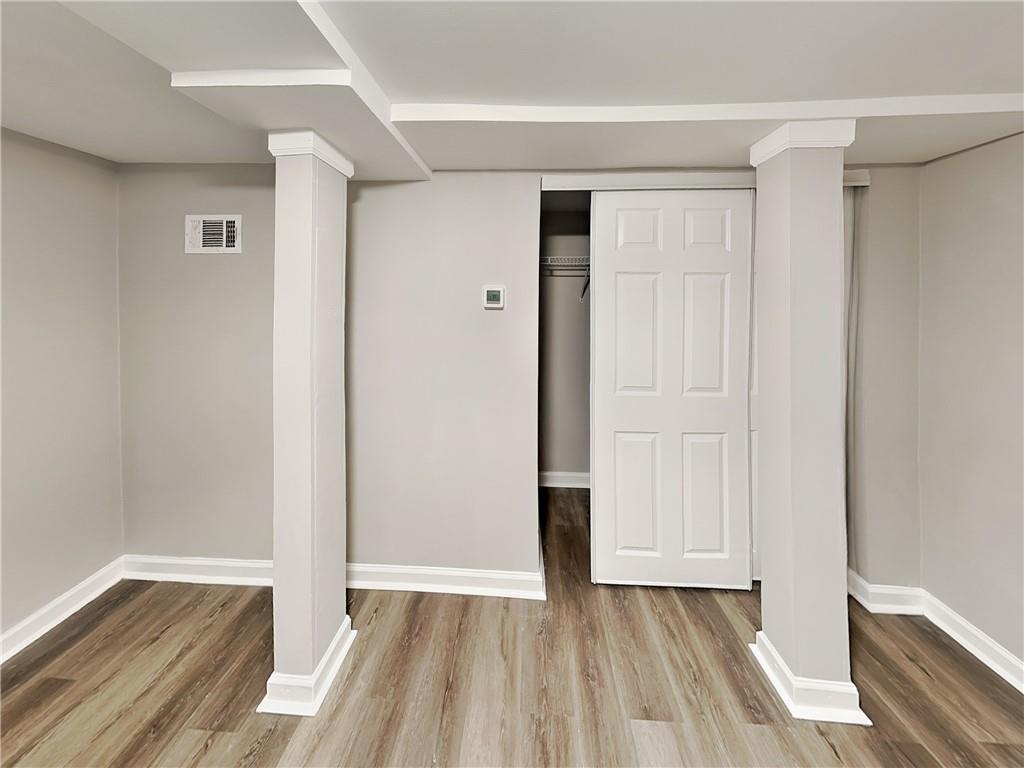 2875 3rd Avenue Southwest, Unit B Atlanta, GA 30315 - Photo 13 of 20 a view of an empty room and wooden floor
