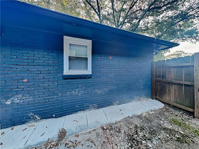 a view of entrance gate of a house