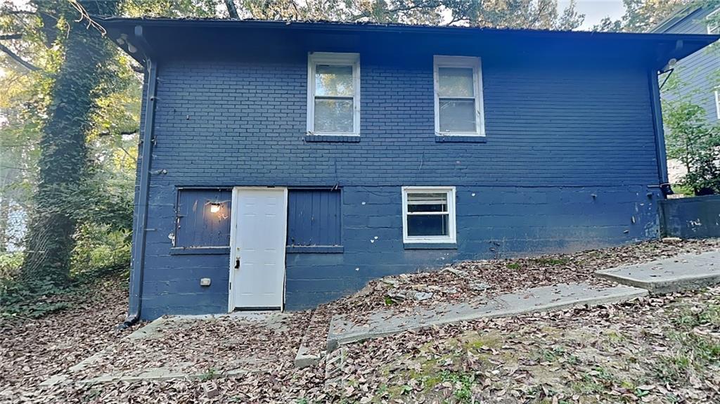 2875 3rd Avenue Southwest, Unit B Atlanta, GA 30315 - Photo 3 of 20 a brick building with a large tree