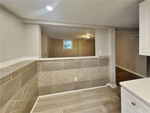 a view of a hallway with entryway