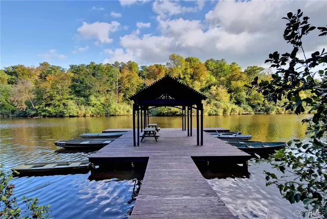 a view of a lake with a sitting space and lake view