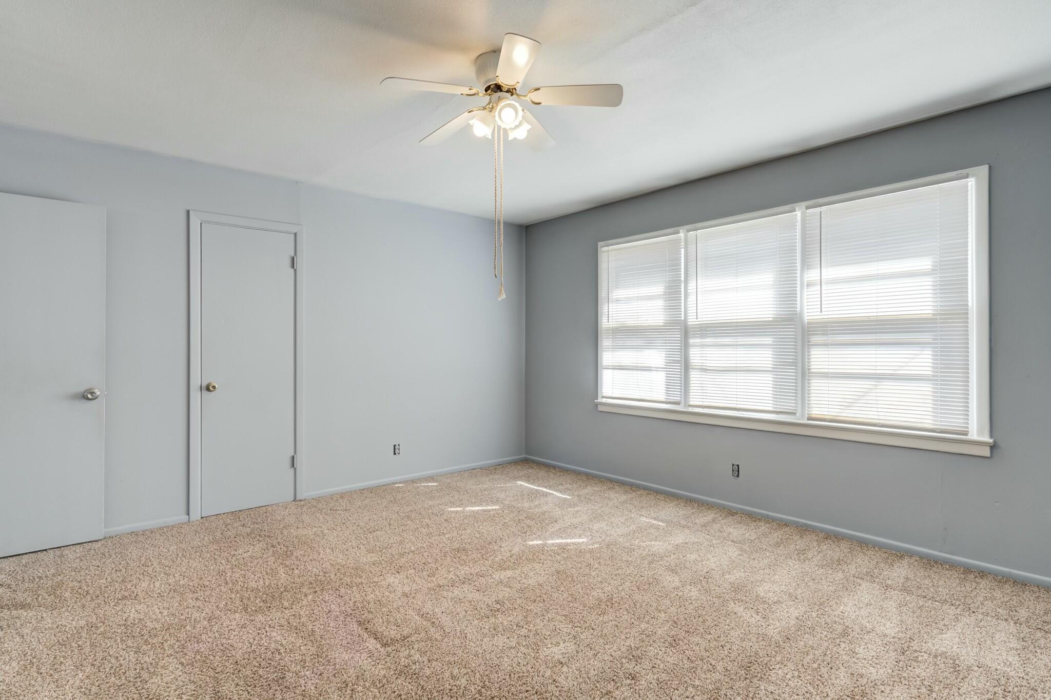 3013 45th Street Lubbock, TX 79413 - Photo 18 of 30 a view of an empty room with a window