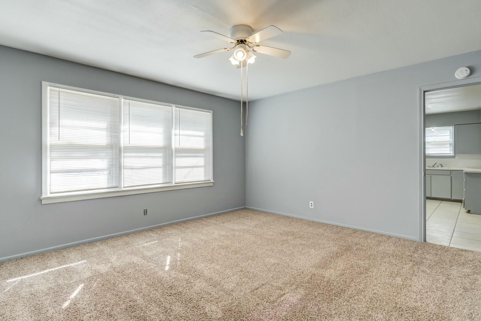 3013 45th Street Lubbock, TX 79413 - Photo 20 of 30 a view of an empty room with a window