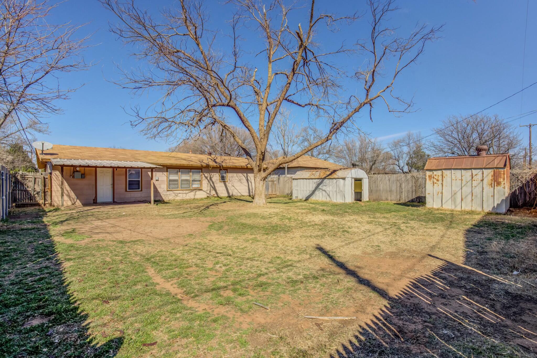 3013 45th Street Lubbock, TX 79413 - Photo 29 of 30 a view of a backyard of the house