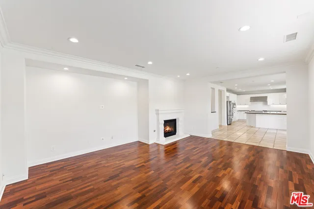 a view of yard with swimming pool and green space