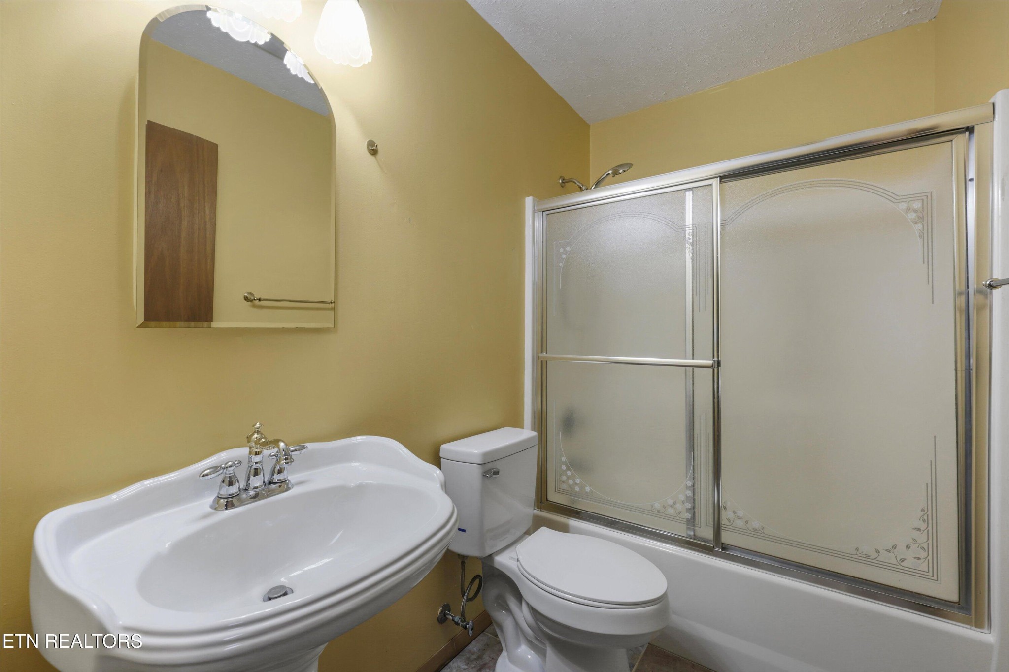 47 Paint Rock Ferry Road Kingston, TN 37763 - Photo 17 of 38 a bathroom with a sink toilet and shower