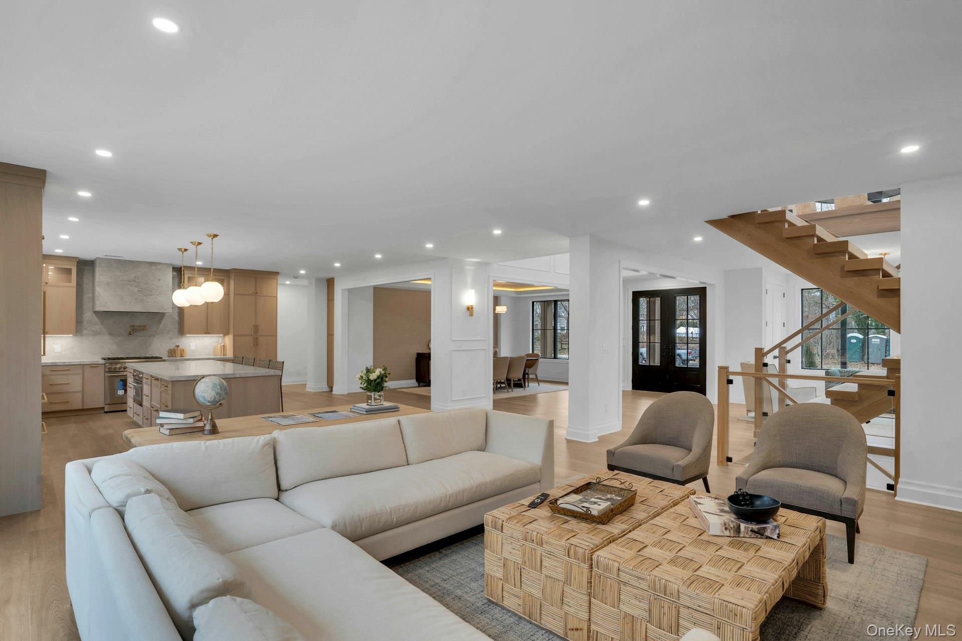 Lot 1-1003 Baldwin Path Dix Hills, NY 11746 - Photo 14 of 50 a living room with furniture and a large window