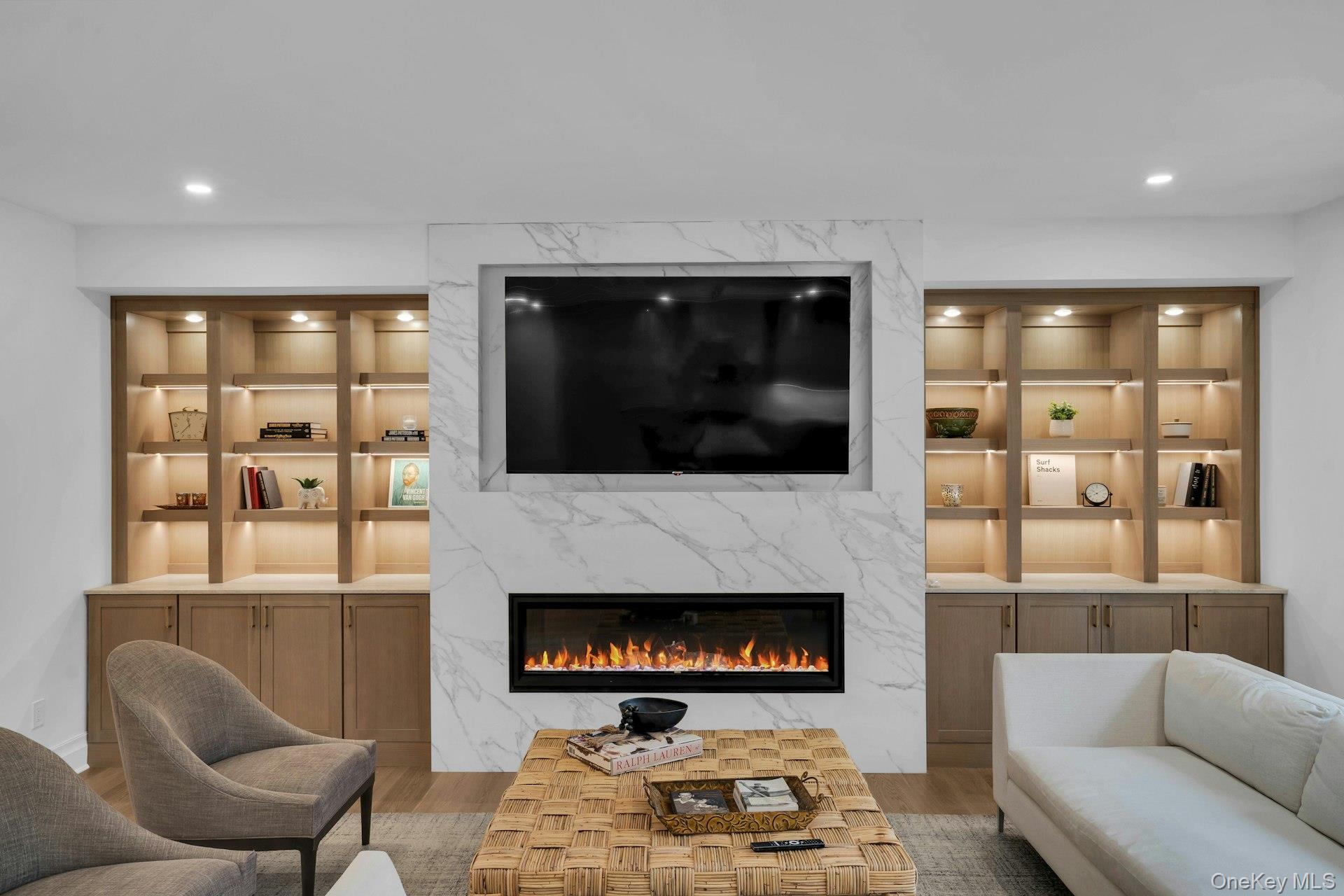 Lot 1-1003 Baldwin Path Dix Hills, NY 11746 - Photo 18 of 50 a living room with furniture and a fireplace