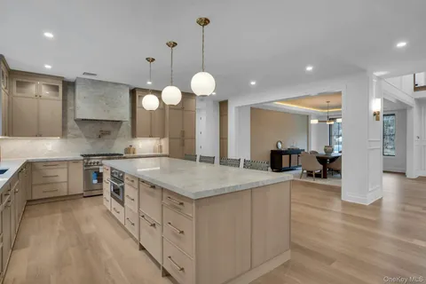 a lobby with furniture and wooden floor