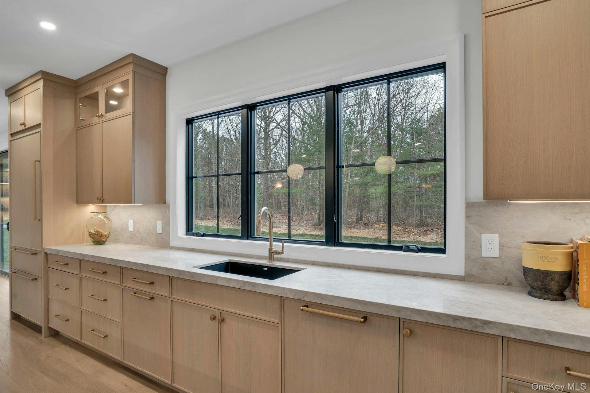 Lot 1-1003 Baldwin Path Dix Hills, NY 11746 - Photo 26 of 50 a kitchen with sink and large window