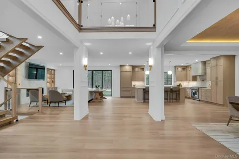 a lobby with furniture and a large window