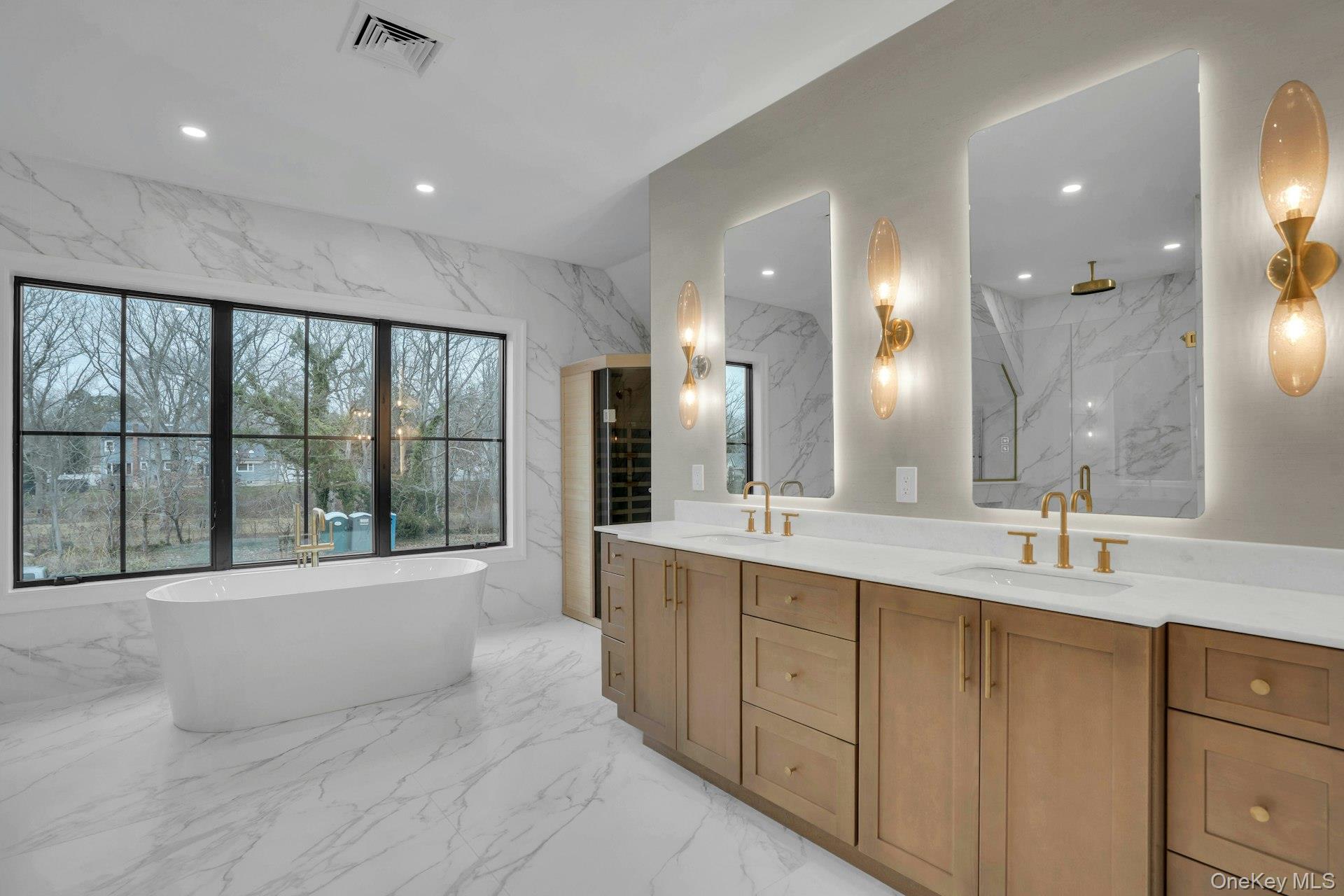 Lot 1-1003 Baldwin Path Dix Hills, NY 11746 - Photo 42 of 50 a large bathroom with a large tub and sink