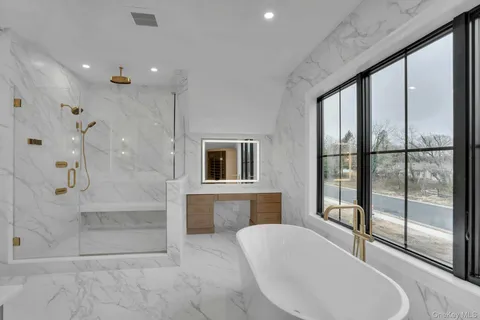 a bathroom with a sink and mirror