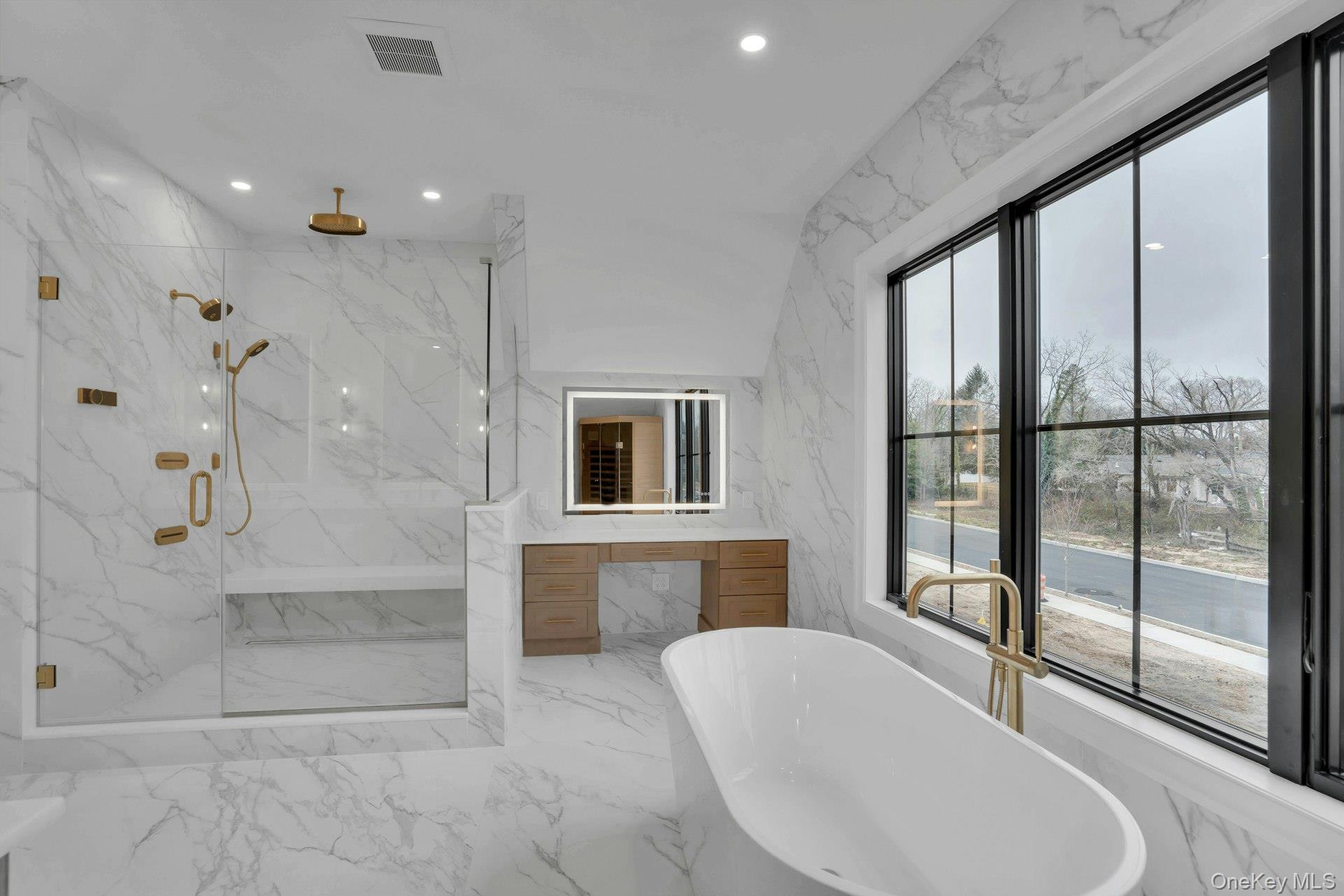 Lot 1-1003 Baldwin Path Dix Hills, NY 11746 - Photo 44 of 50 a bathroom with a sink and mirror