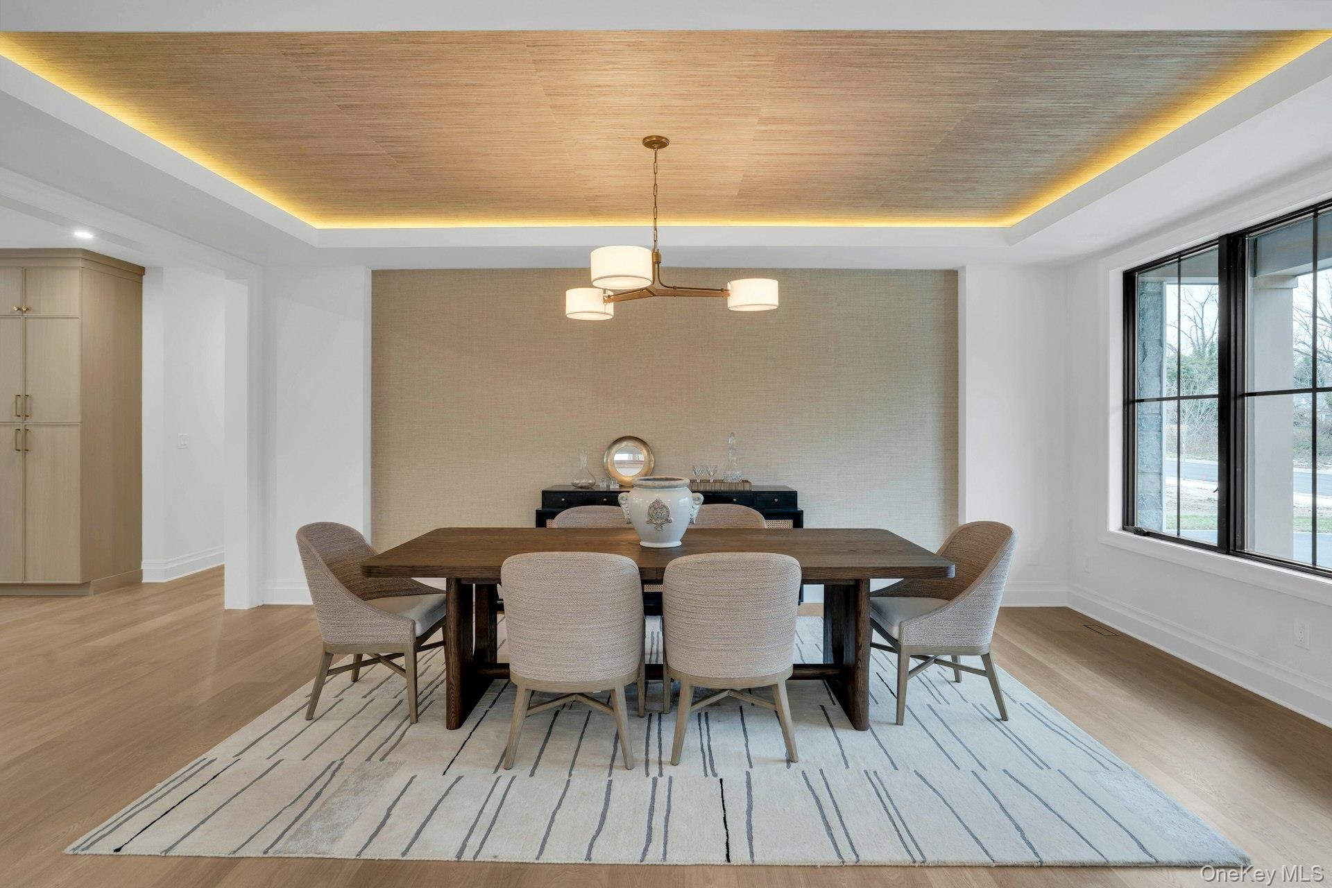 Lot 1-1003 Baldwin Path Dix Hills, NY 11746 - Photo 6 of 50 a view of a dining room with furniture and wooden floor
