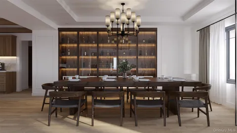a view of a dining room with furniture and chandelier