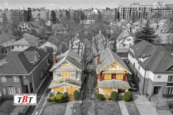 an aerial view of multi story residential apartment building