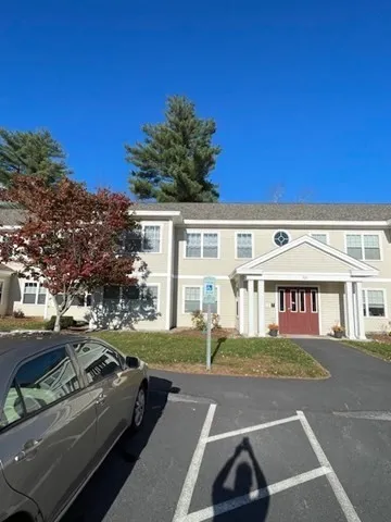 a car parked in front of a house