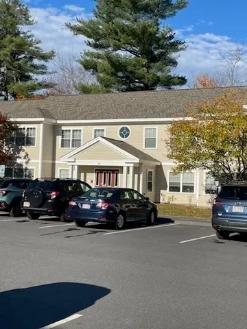 a view of outdoor space with wooden floor and lake view
