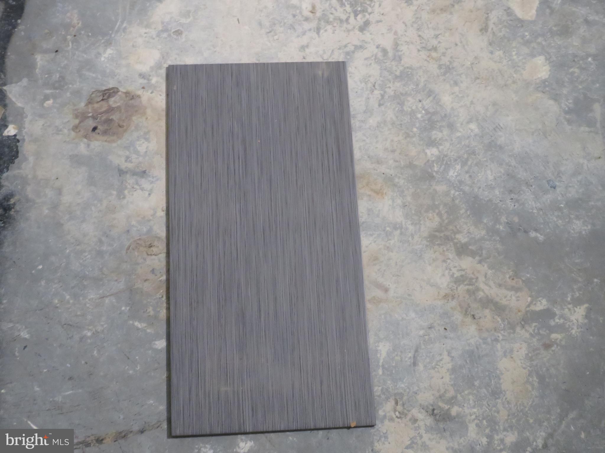 4948 Old Court Road Randallstown, MD 21133 - Photo 41 of 47 Tile for basement bathroom, just have to install