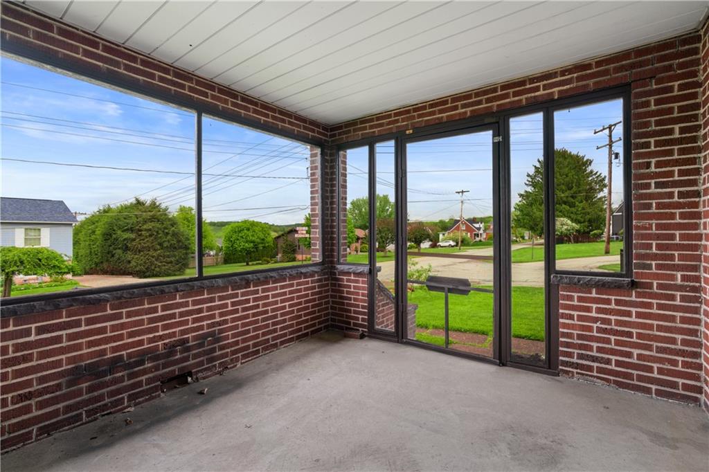 206 Constitution Street Perryopolis, PA 15473 - Photo 3 of 36 Screened-in Porch