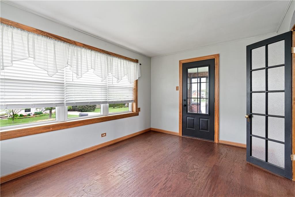 206 Constitution Street Perryopolis, PA 15473 - Photo 4 of 36 Beautiful Sunroom for extra living space! Use a den, reading room, office, etc.