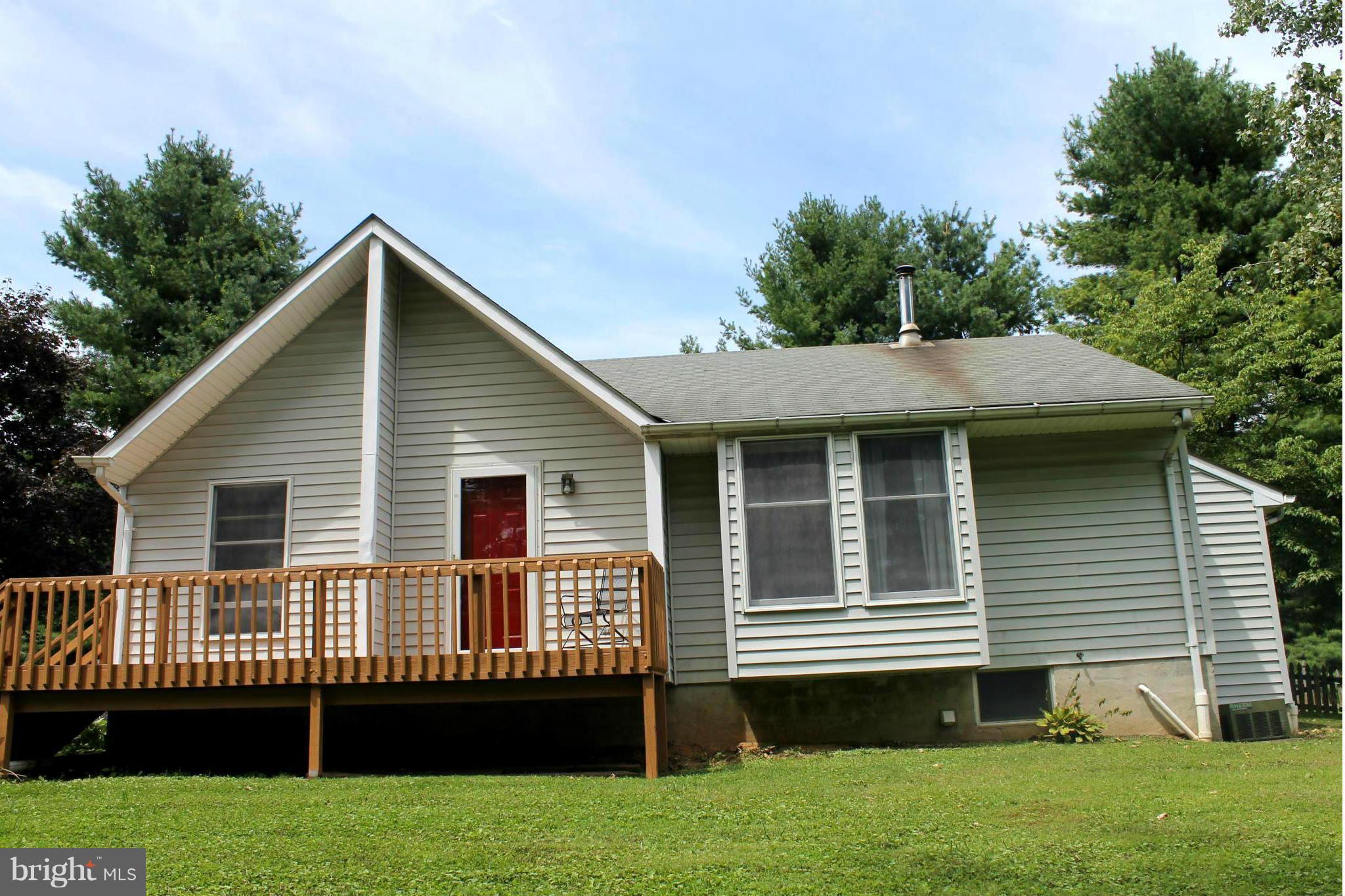 15405 Dover Road Upperco, MD 21155 - Photo 2 of 22 a view of a house with a backyard