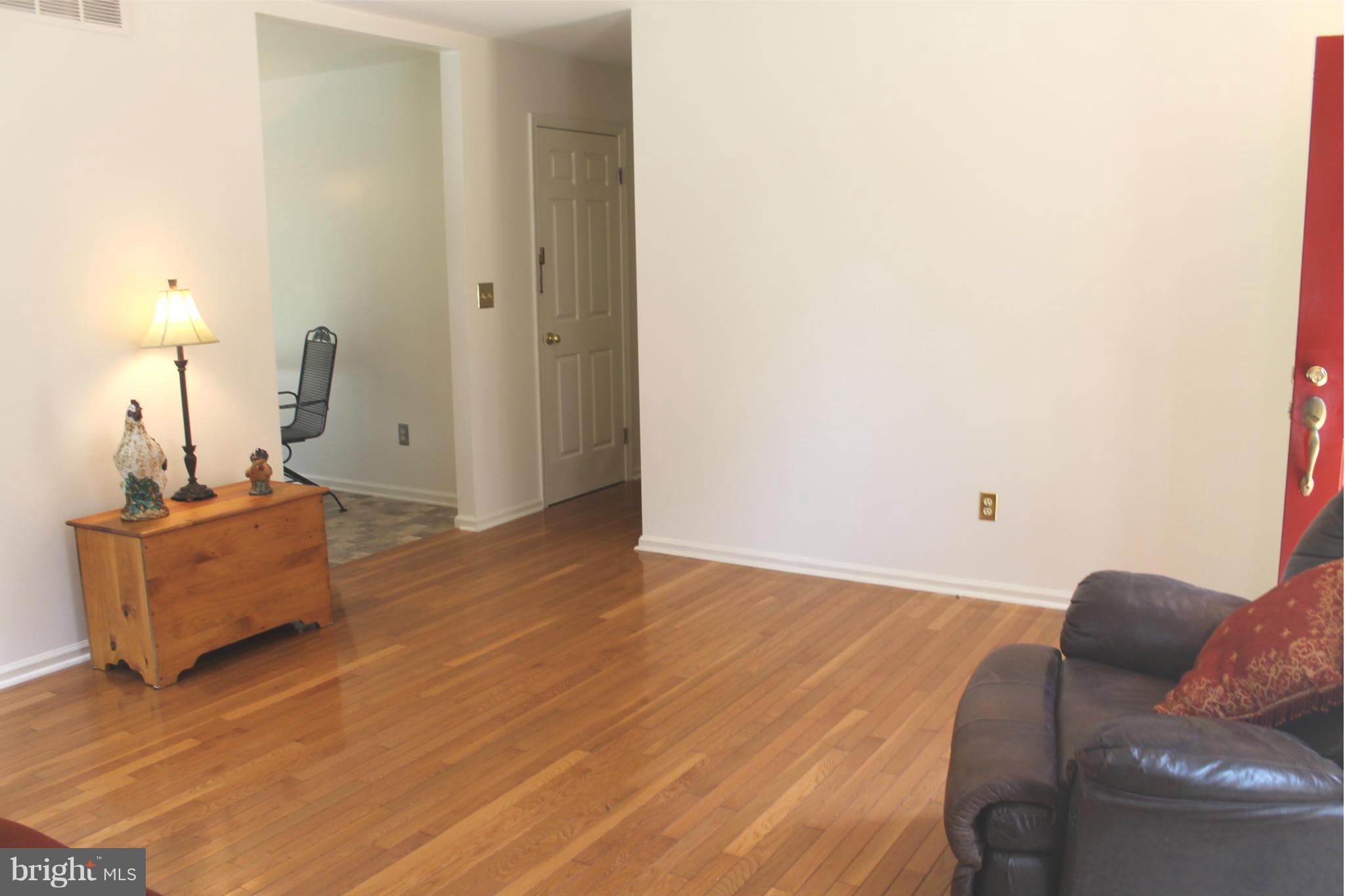 15405 Dover Road Upperco, MD 21155 - Photo 7 of 22 a living room with furniture and a wooden floor