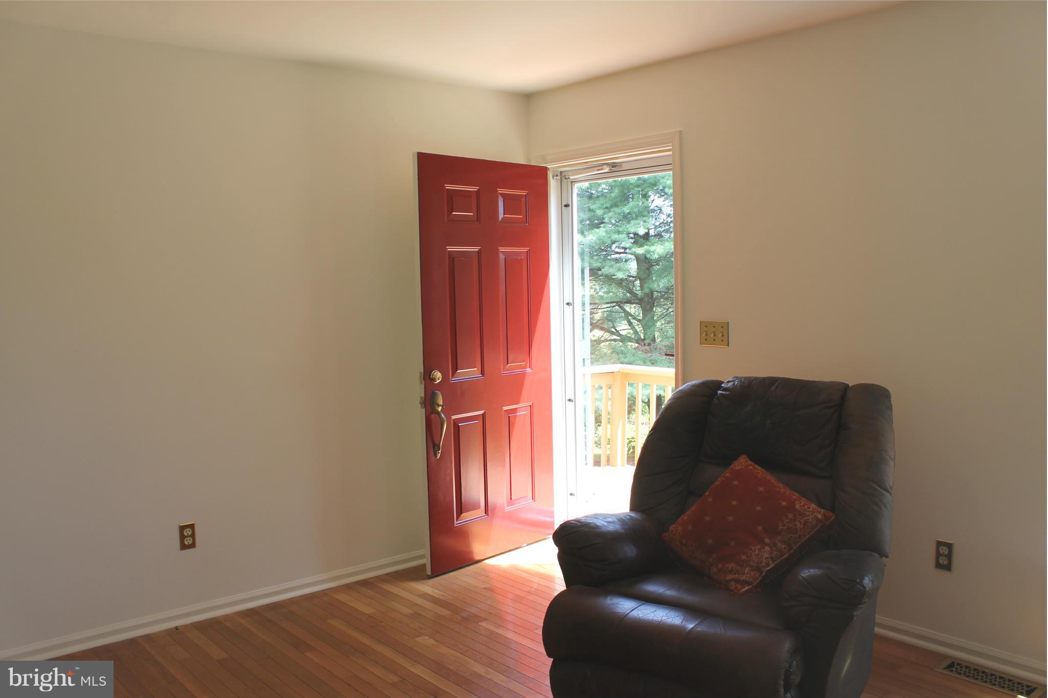 15405 Dover Road Upperco, MD 21155 - Photo 9 of 22 a living room with furniture and a window