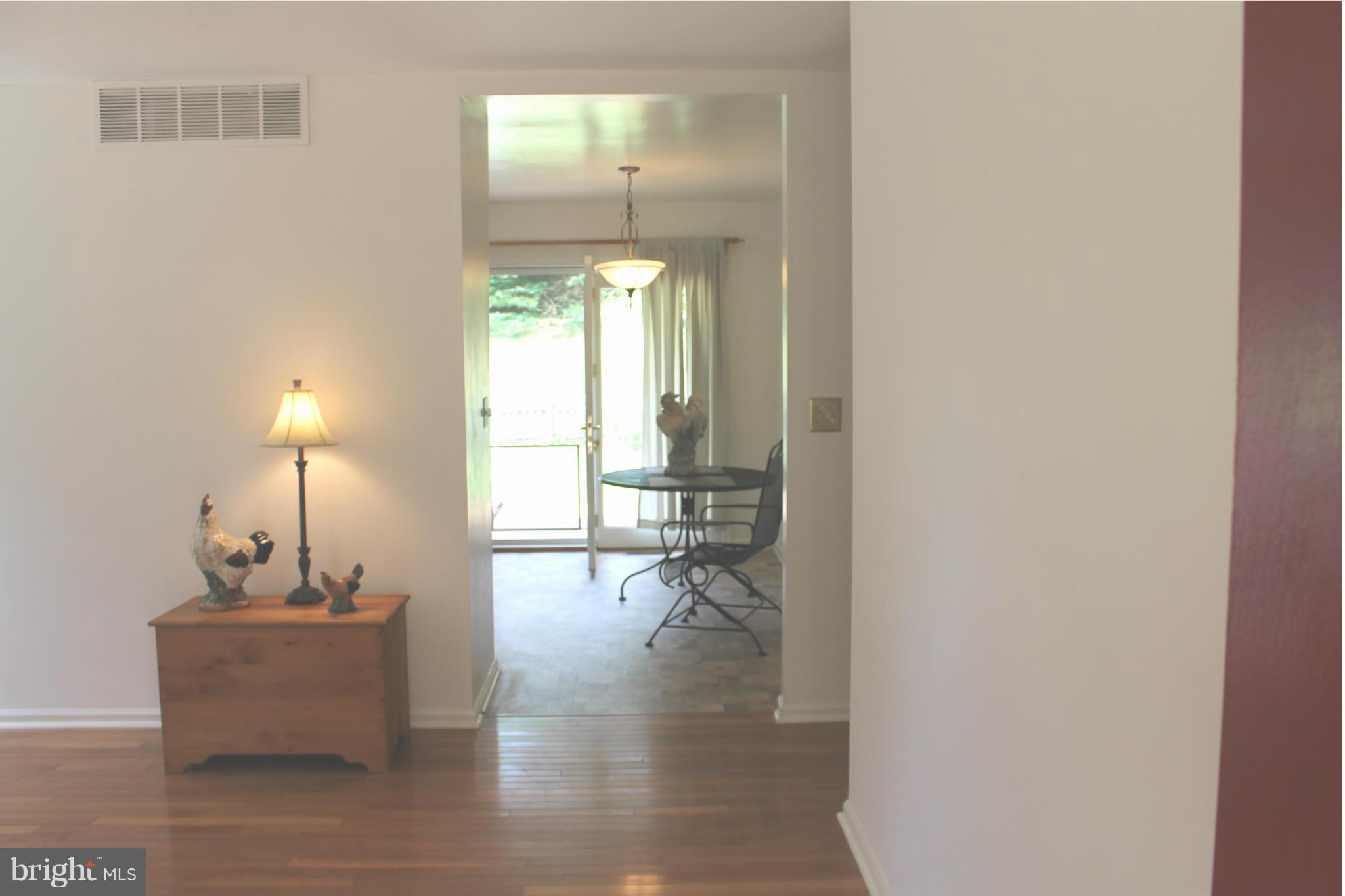 15405 Dover Road Upperco, MD 21155 - Photo 10 of 22 a living room with furniture and a table