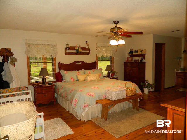 21372 County Road 49 Silverhill, AL 36576 - Photo 15 of 50 Notice beautiful hardwood floors.