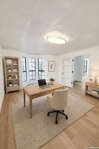 a living room with furniture and a table