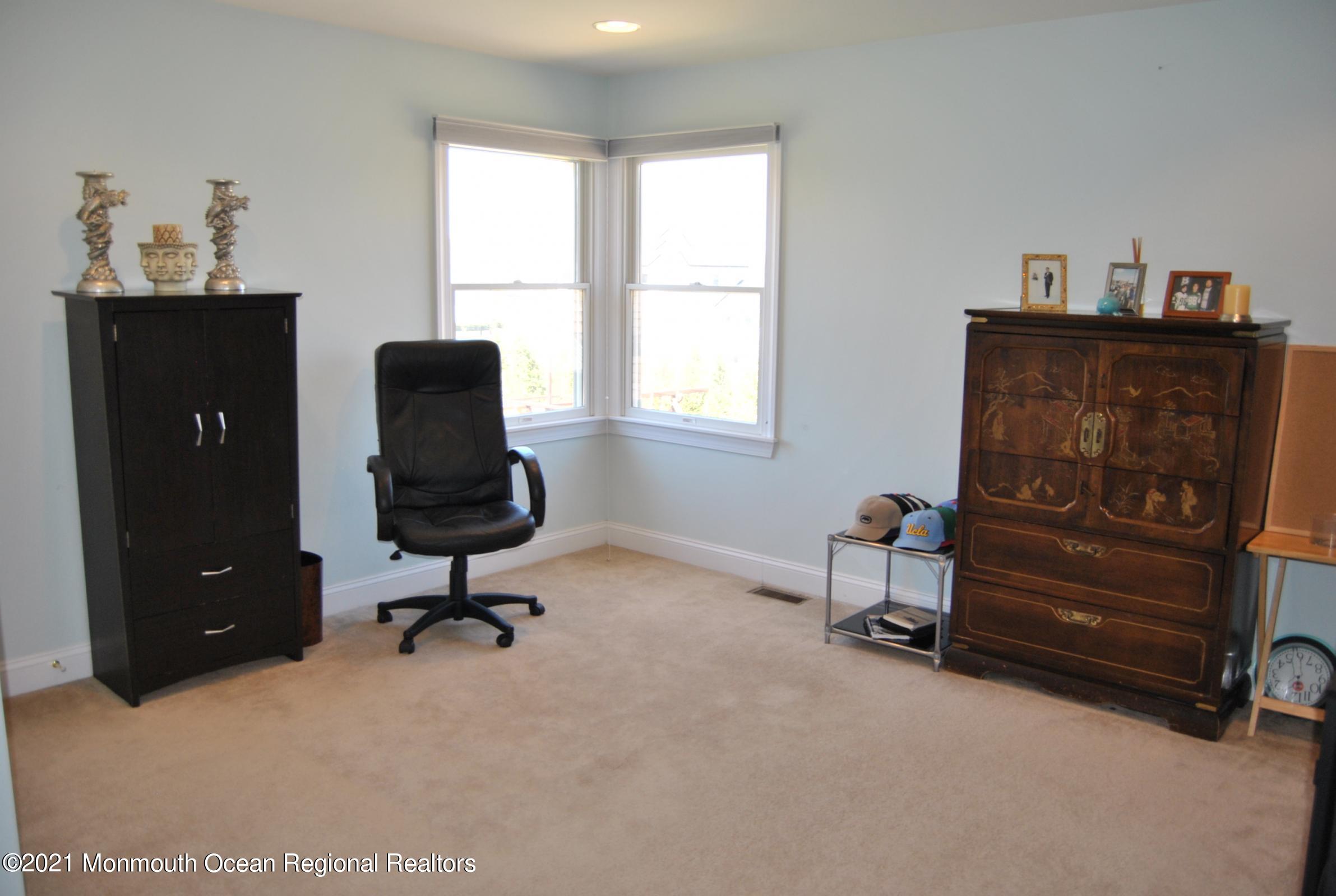 2 Hanging Rock Road Freehold, NJ 07728 - Photo 20 of 55 a view of a workspace with furniture and a window