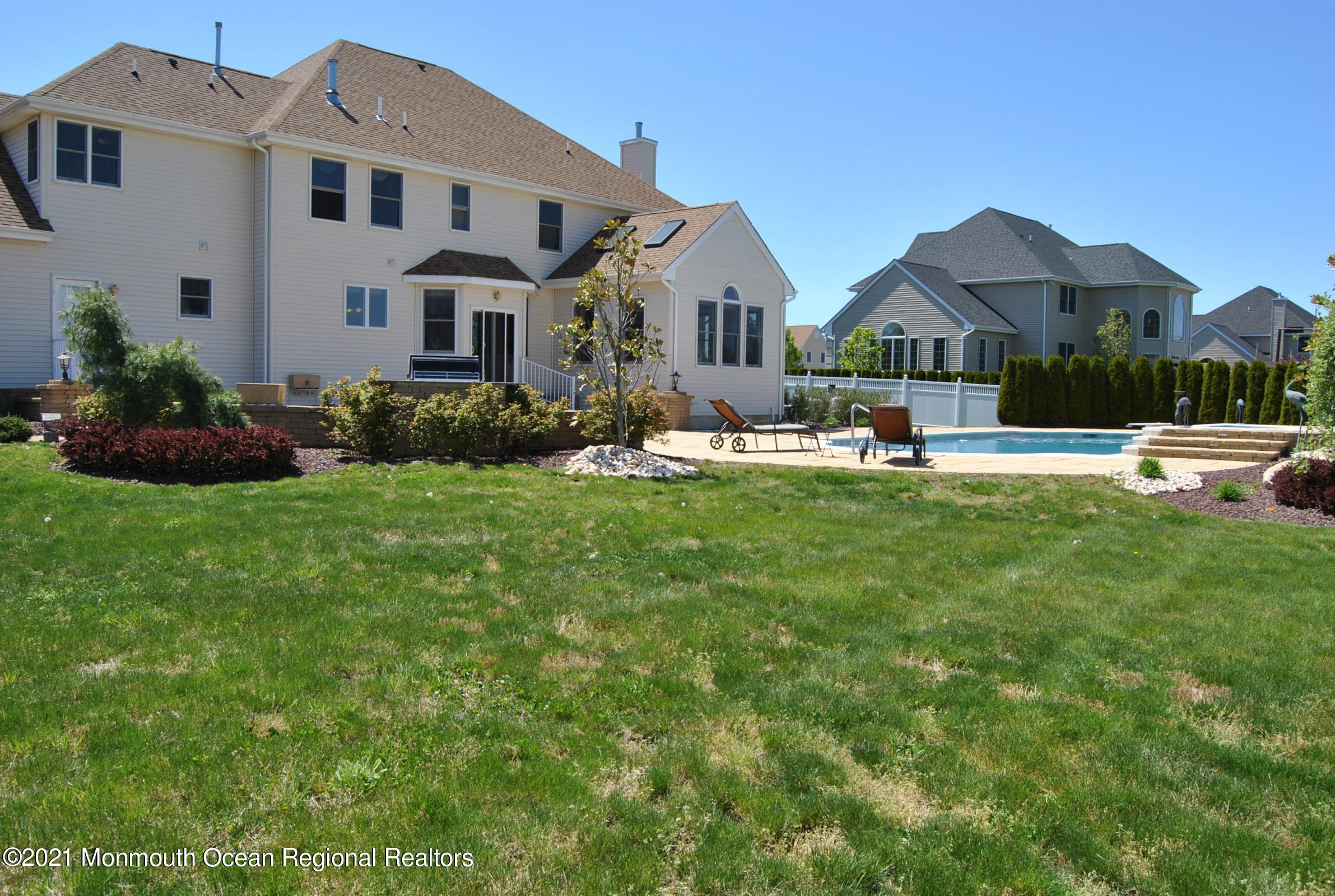 2 Hanging Rock Road Freehold, NJ 07728 - Photo 38 of 55 a front view of house with yard and green space