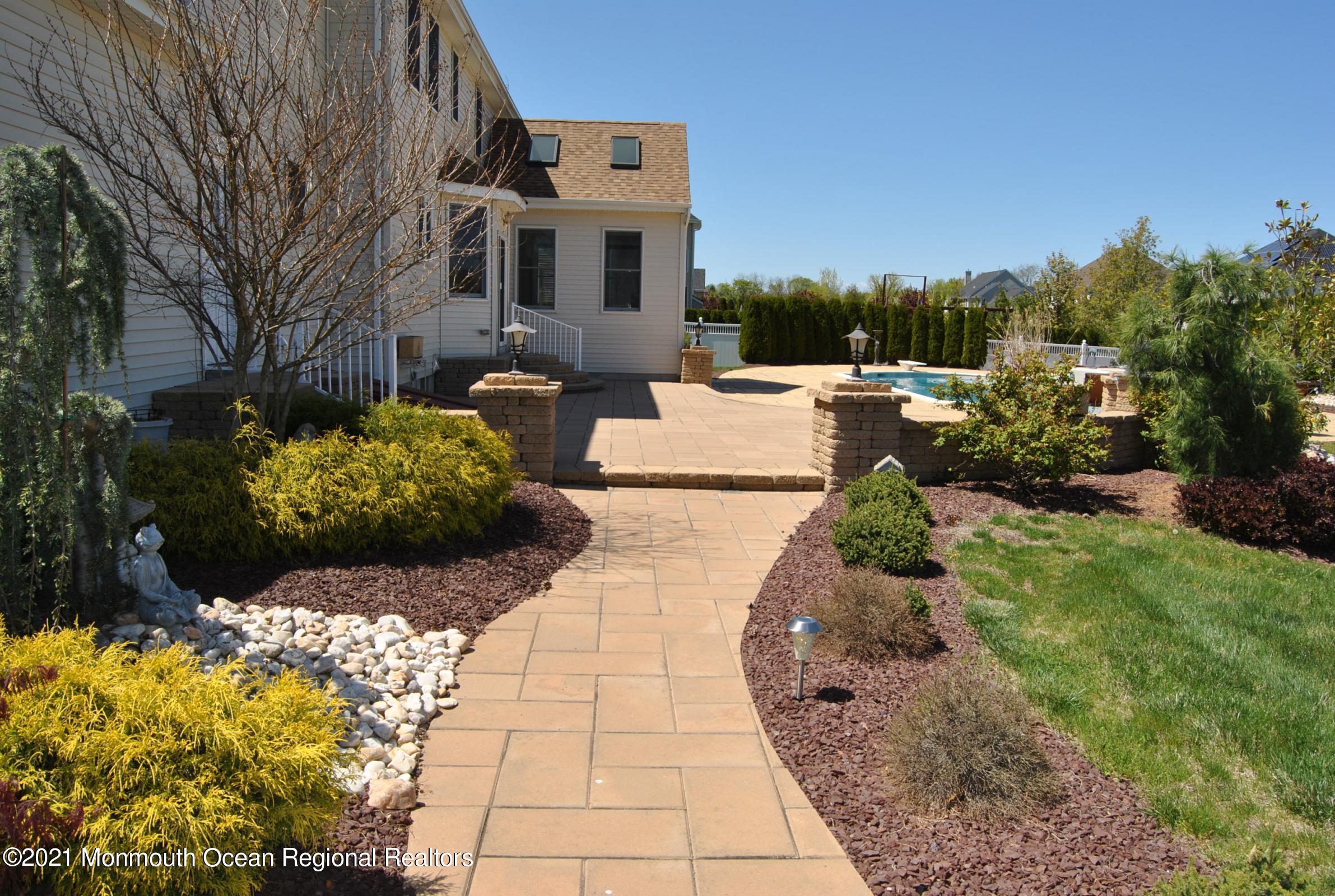2 Hanging Rock Road Freehold, NJ 07728 - Photo 39 of 55 a view of a backyard of the house