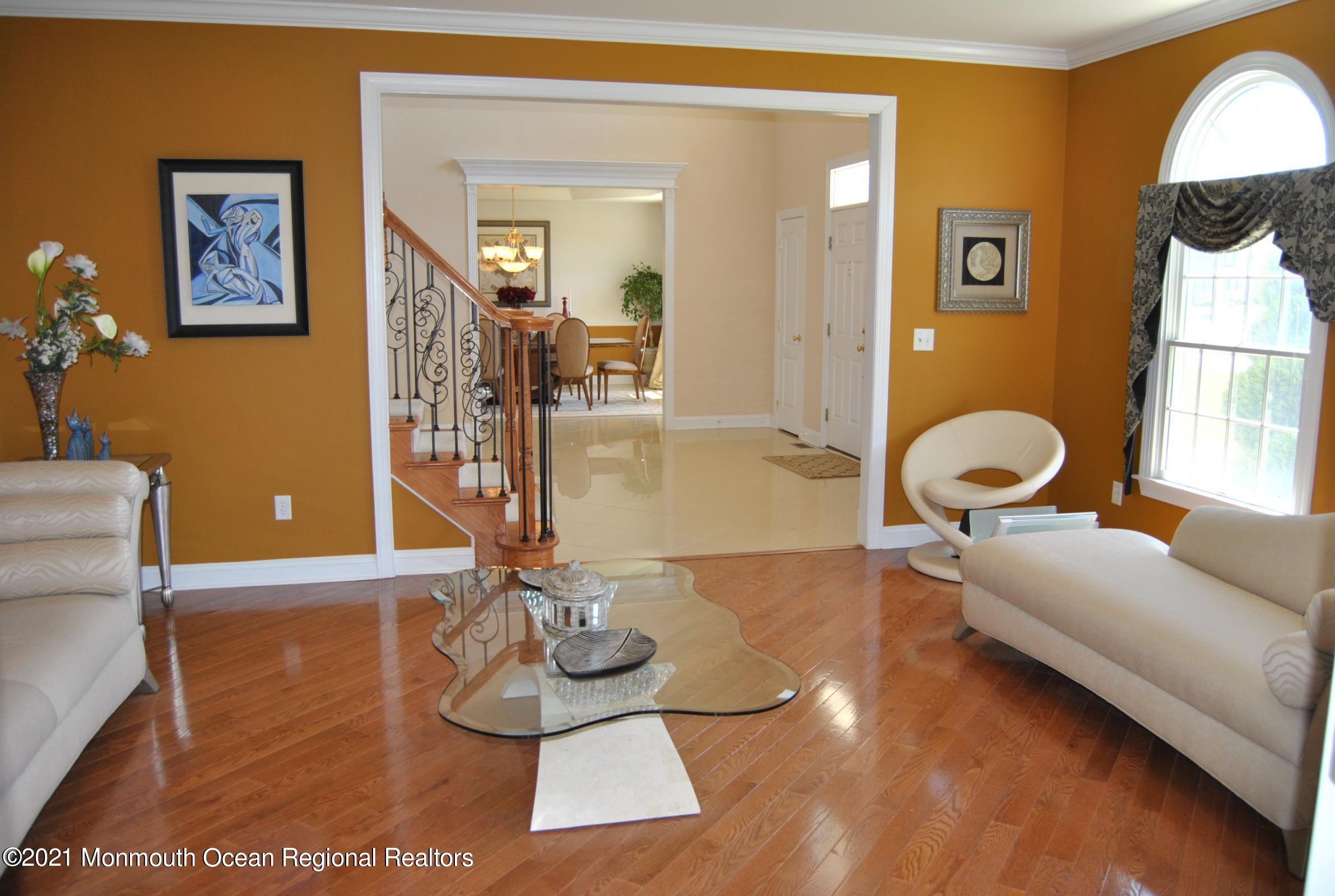 2 Hanging Rock Road Freehold, NJ 07728 - Photo 5 of 55 a living room with furniture and a wooden floor