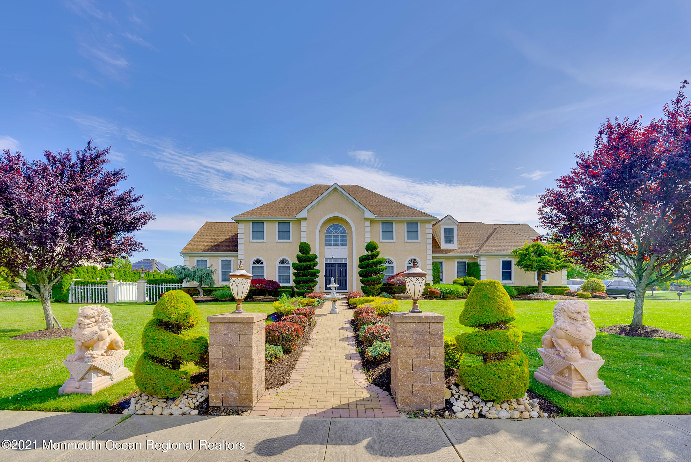 2 Hanging Rock Road Freehold, NJ 07728 - Photo 45 of 55 a front view of a house with garden