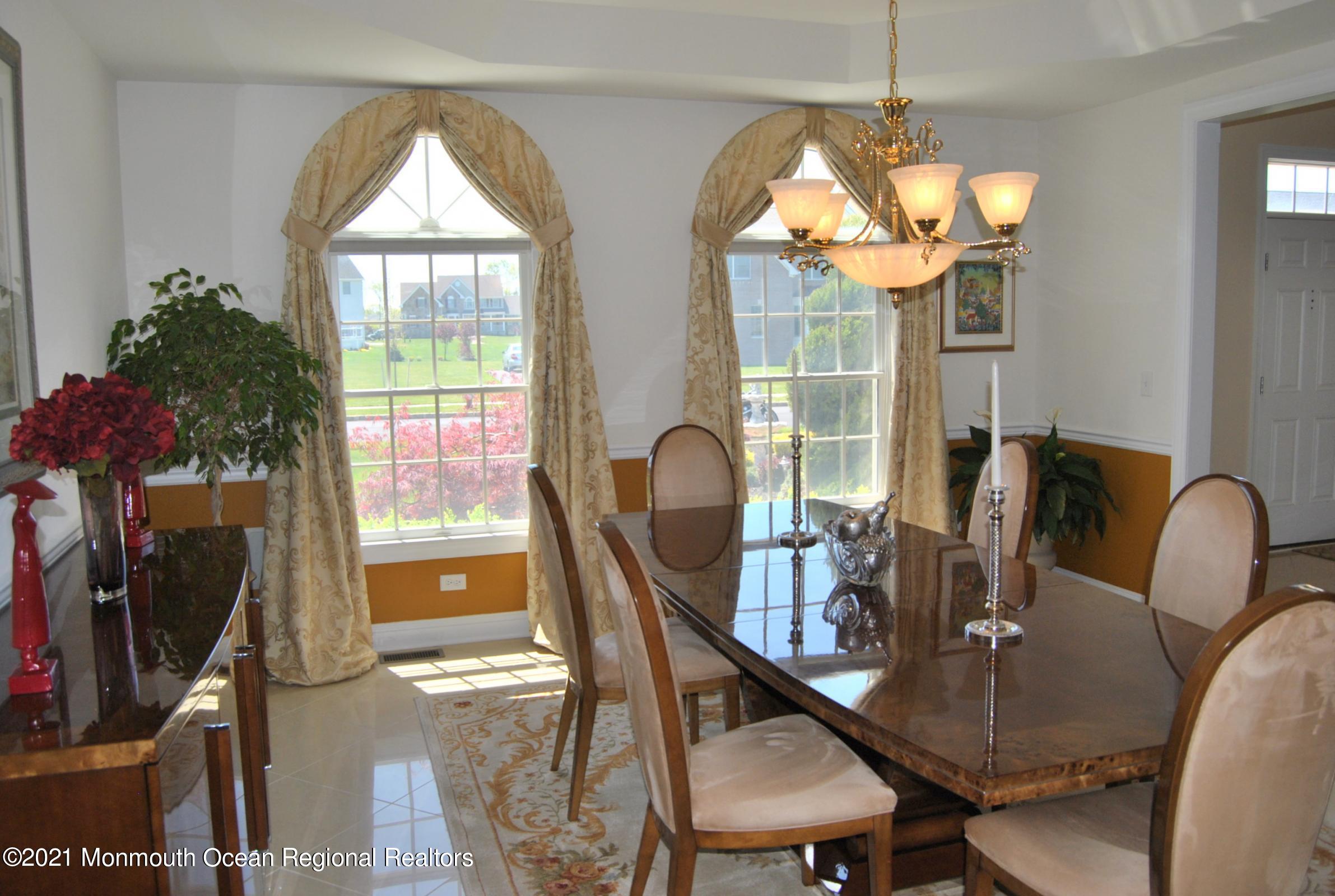 2 Hanging Rock Road Freehold, NJ 07728 - Photo 7 of 55 a view of a dining room with furniture window and outside view