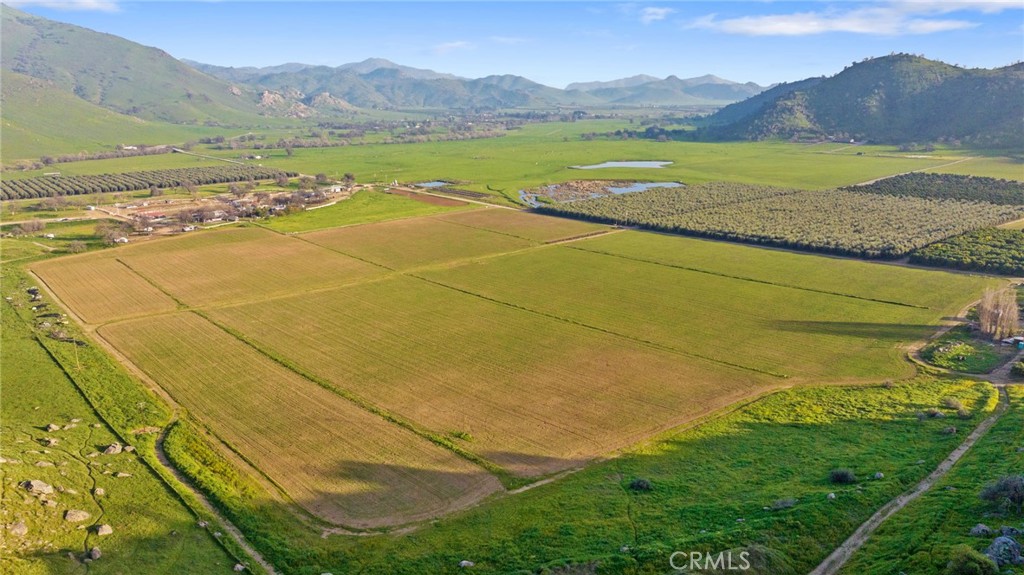 19400 398th Woodlake, CA 93286 - Photo 3 of 51 a view of an aerial view of residential houses with outdoor space and mountain view