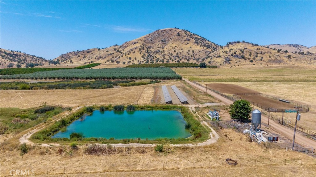 19400 398th Woodlake, CA 93286 - Photo 39 of 51 a view of a water with a mountain in the background